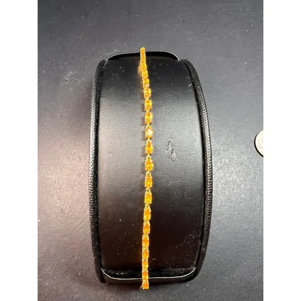 Yellow spessartine garnet tennis bracelet in gold over sterling silver
